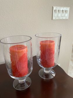 Two large glass that can be used for candle holder or any anything else