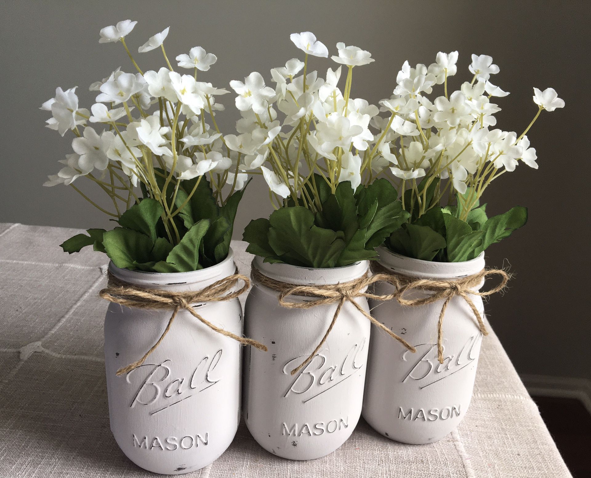 Distressed mason jar vases with silk flowers included! $13 for 3 You pick the jar/flower colors