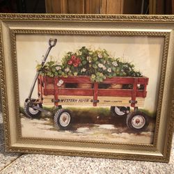 Picture of wagon filled with lots of flowers