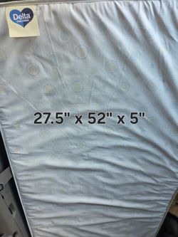 Delta Children Two-Stage Crib and Toddler Mattress, water proof, in good clean condition.