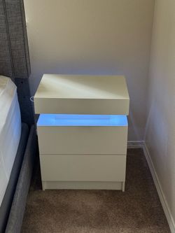 White bedside table with USB and LED lights