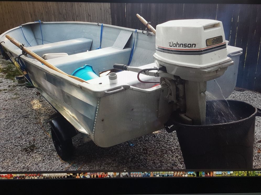 14 foot aluminum boat with 25 horsepower motor and trailer