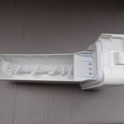 Ice Dispenser Tray And Auger Assembly
