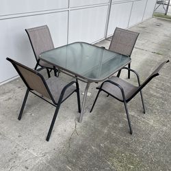 Patio table and chairs set (in store)