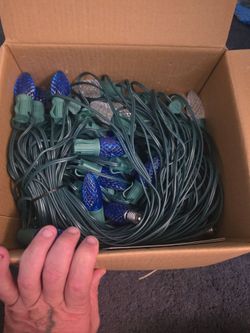 2 boxes of white and blue led Christmas lights