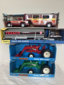 SET OF 3 ERTL VINTAGE TRUCKS AND 1 NYLINT ALL NEW 