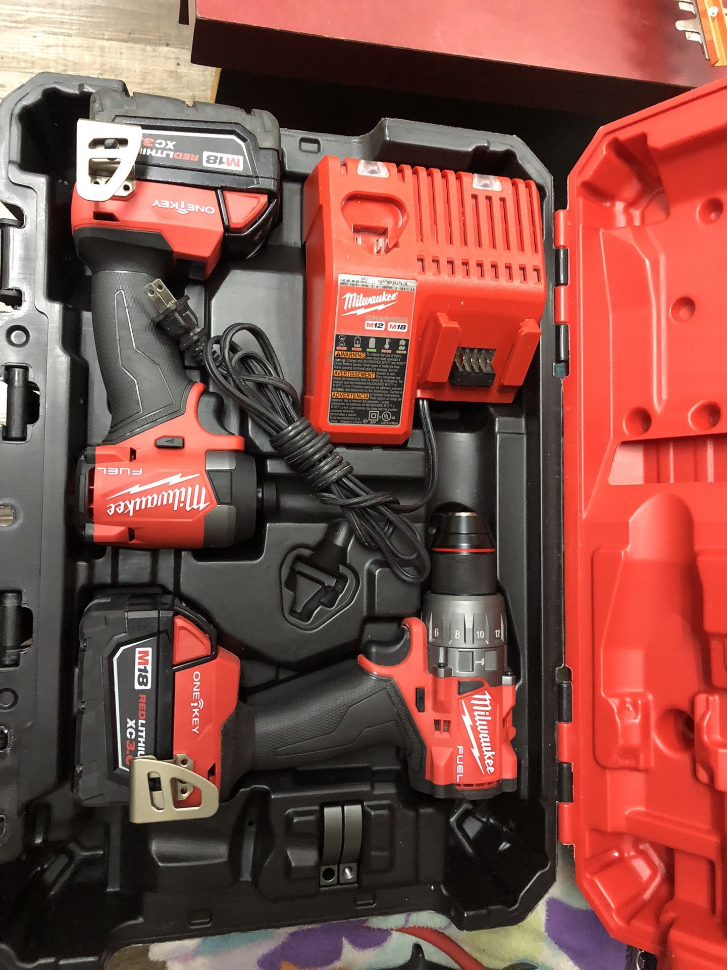 1003 Milwaukee 20v Brushless Impact & Combo With 2 Batteries And Charger 012881