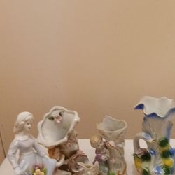 Collection of 7 Matched Porcelain Decorative Figurines/ Objets d Art