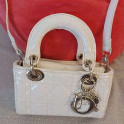 👜