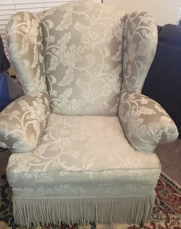 Very elegant golden wingback chair