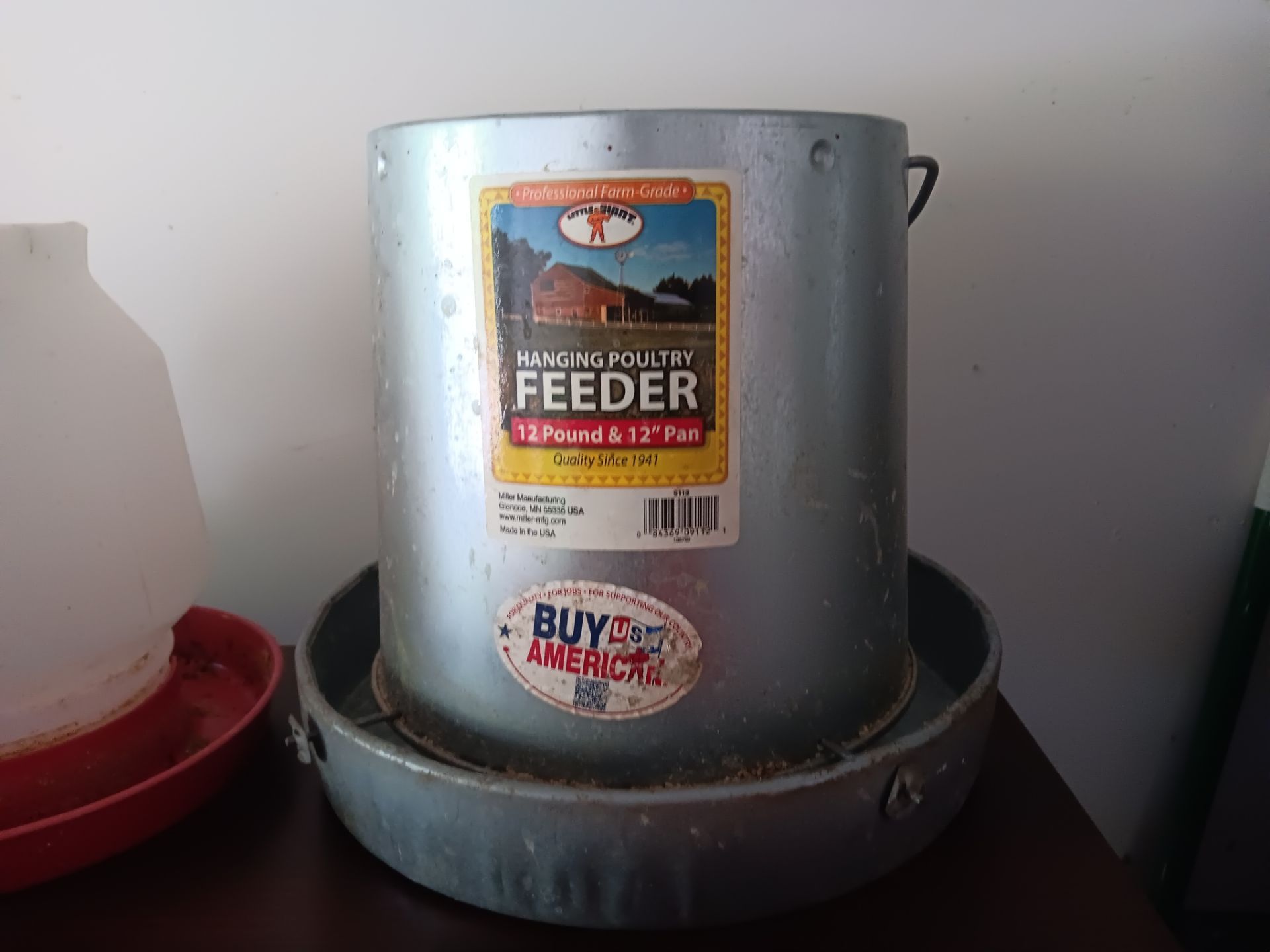 Chicken feeder, waterer, heat lamp and cage