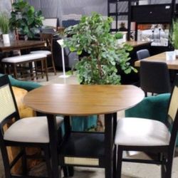 Counter height table: Two (2) drop leaves can easily fold down to save space with 2 counter height chairs(New)