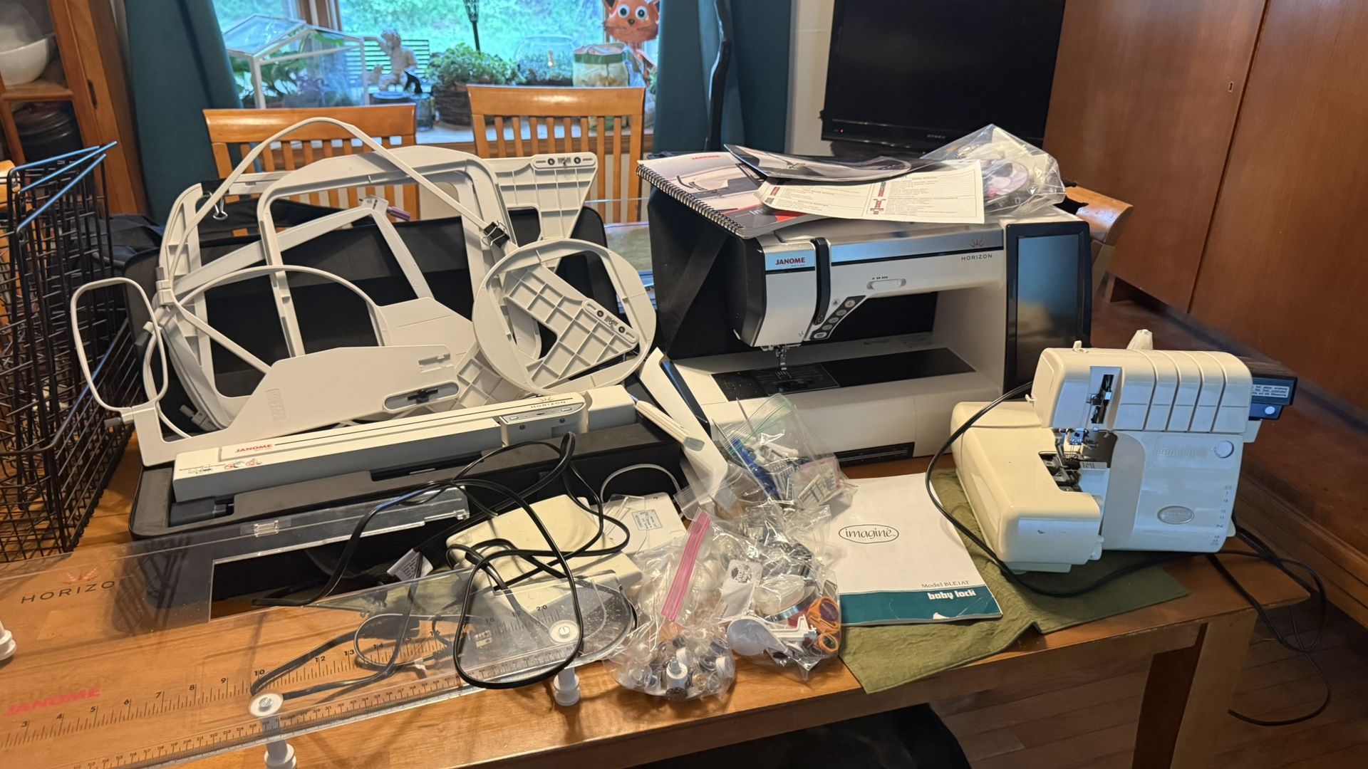 Janome Memory Craft 12000 Embroidery Machine and Baby Loch BLE1AT Serger