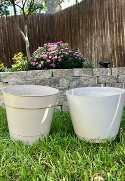 Two large plastic planters (cream color)