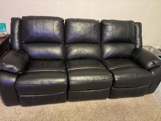 Leather reclining sofa