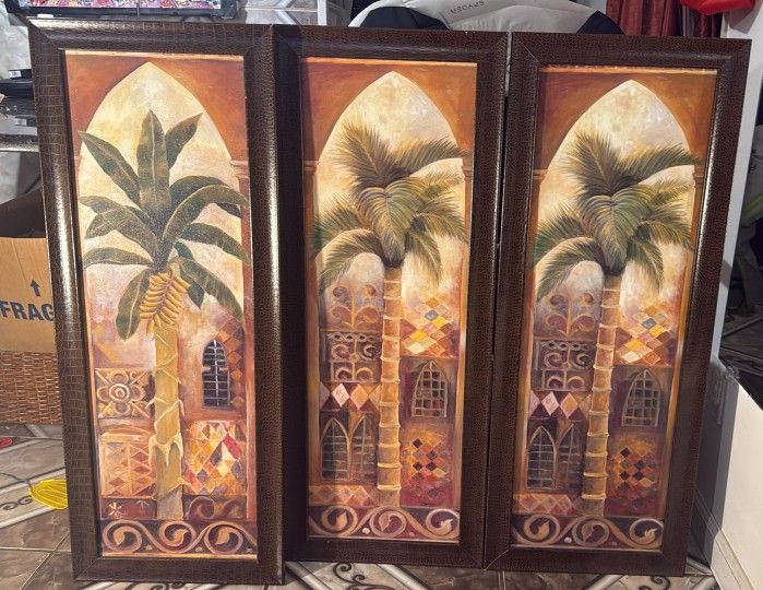 Triptych of decorative paintings with palm tree and Arabic architecture. 15x40