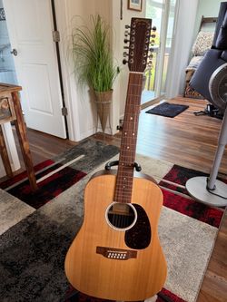 Martin X series 12 string mint condition heart case