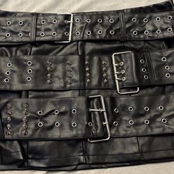 Mini Leather skirt with buckles