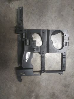 Headlamp mounting panel