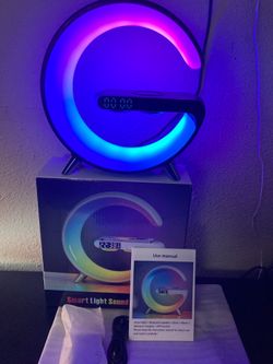 Alarm clock that is blue tooth speaker and charges your phone wirelessly