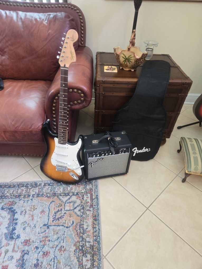 guitar,amplifier and guitar case.