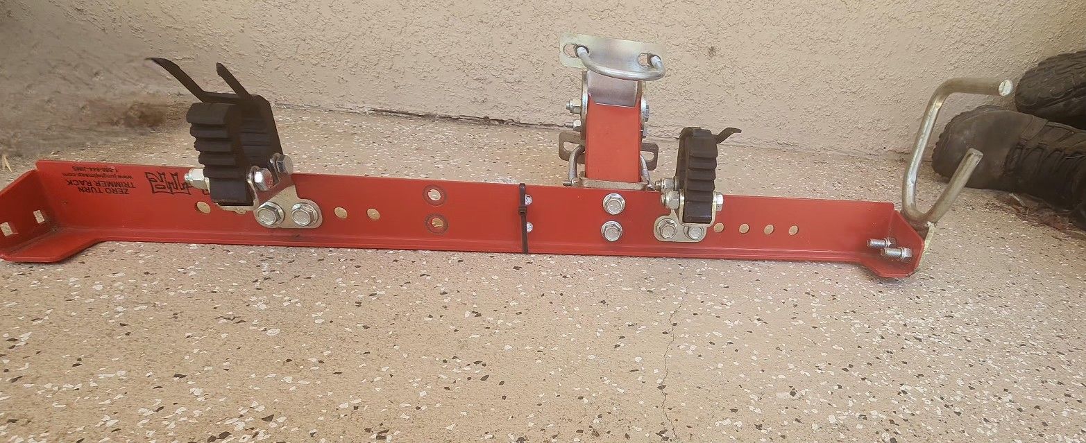 Jungle Jim's ZTR-TR Zero Turn Trimmer Rack, black clips do not lock, can get a replacement
