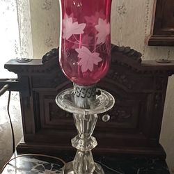 Pair of Bohemian style cranberry glass hurricane lamps with etched cranberry glass shades