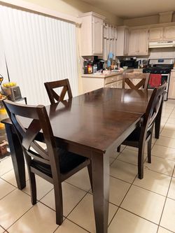 Dining table with four chairs