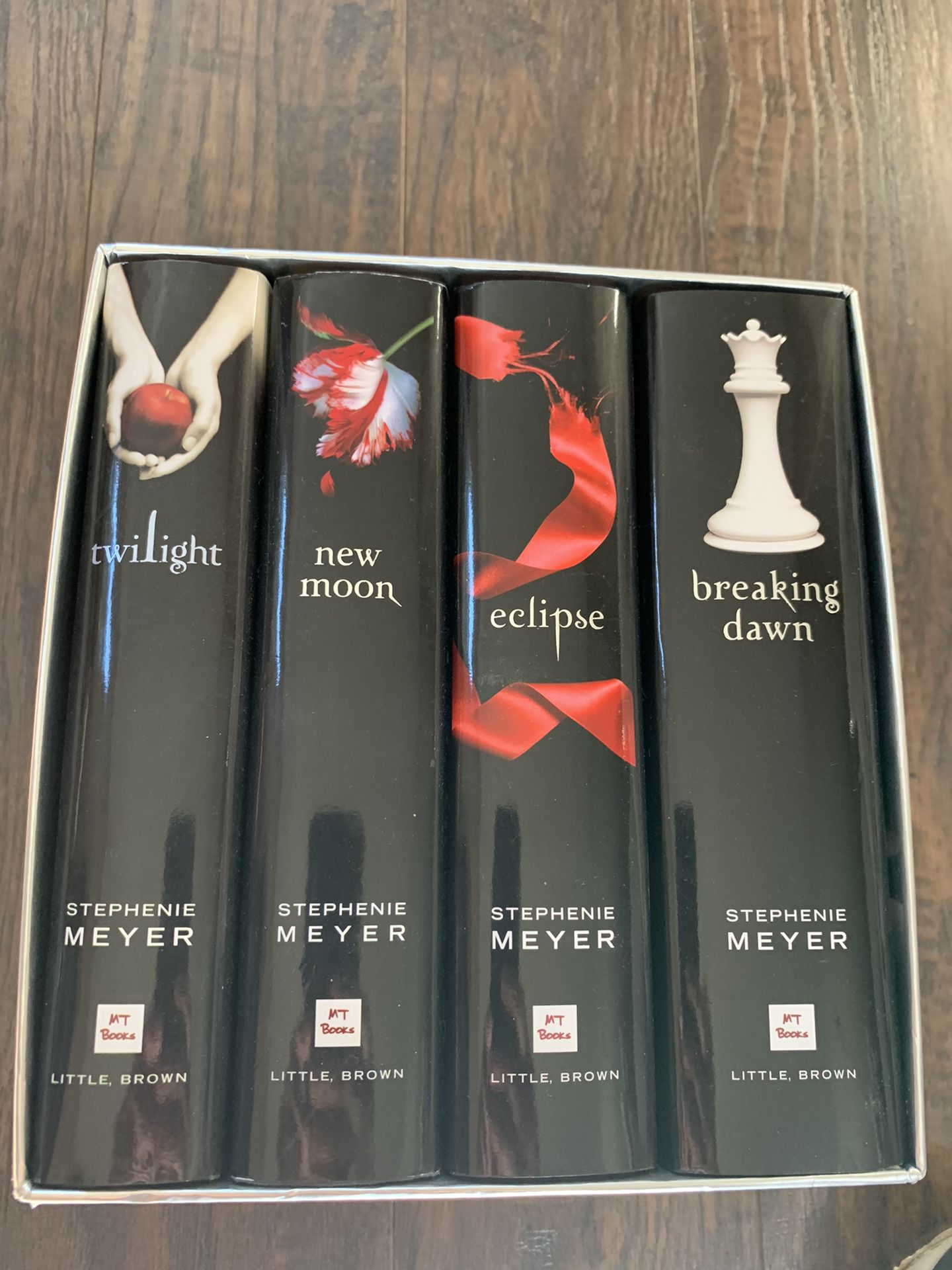 Twilight hard cover books - set of 4 for $25, each book retails for 20. Also, we have soft paperback copies of Twilight and New Moon plus extra hard