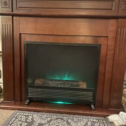 Fire Place With Grate And Fake Logs