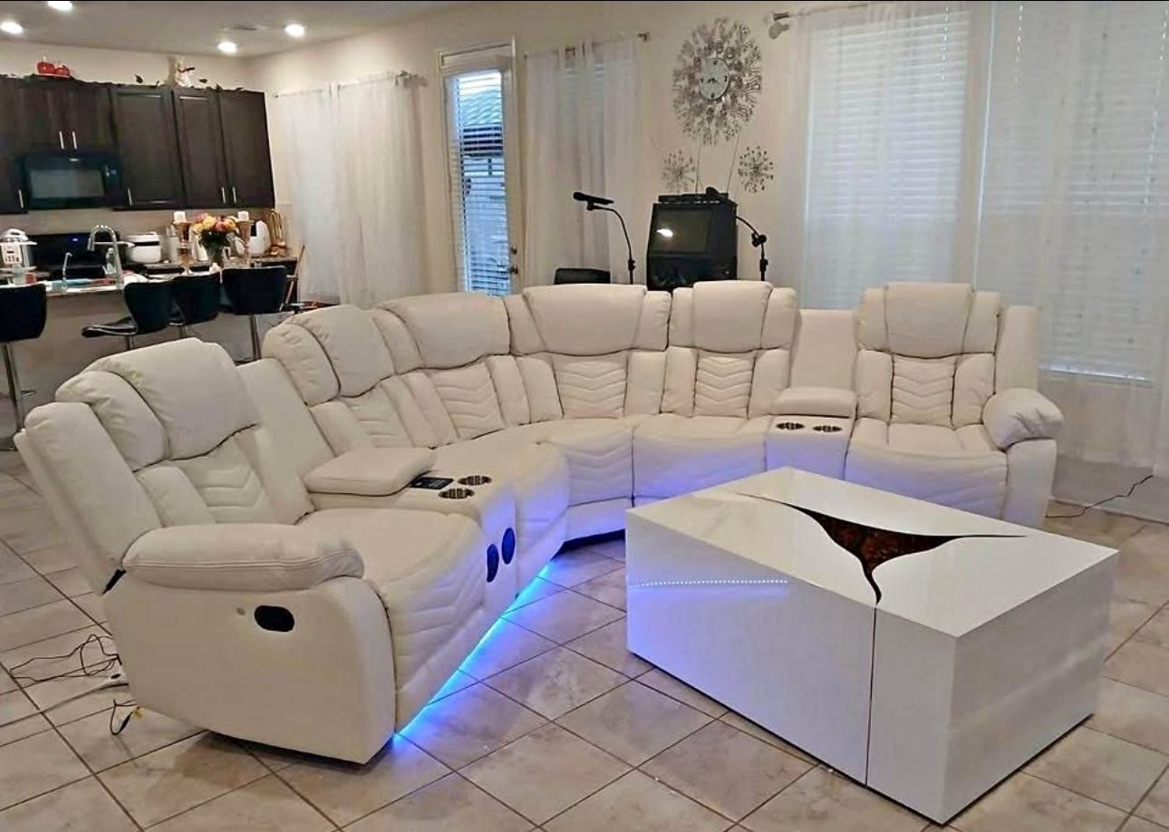New Alexa2023 White Reclining Sectional Features 2 recliners total (1 on left side, 1 on right side) LED light strips. Bluetooth Speaker. Smart Phone