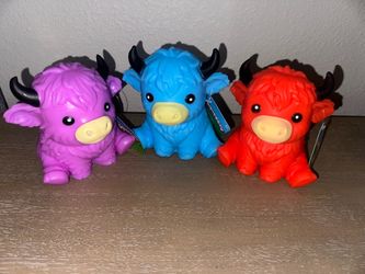 Squeezy squishy baby cow lot purple blue red