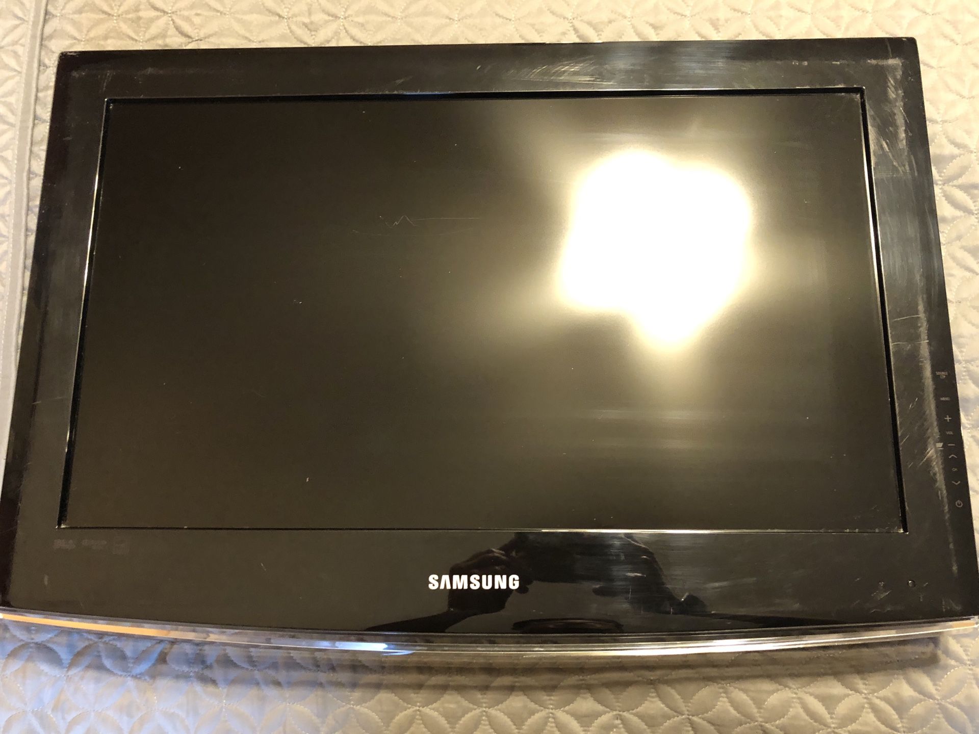 Samsung 26” Flatscreen Television, (No remote or base so can be hung on wall) all standard cable remotes such as Fios and Xfinity are compatible with