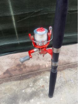 Berkley Fusion 206 spinning reel featuring a bright red metal body and an aluminum spool.