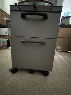 Metal cabinet with lock