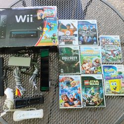 Nintendo Wii Bundle w/8 Games, 2 Controllers, Nunchuk, Box, Console & Cords 