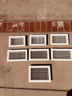 7 White metal air vents