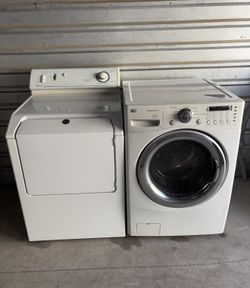 White LG Washer And Maytag Electric Dryer