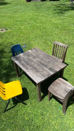 Pottery barn solid wood kids table and chairs with two extra kids chairs