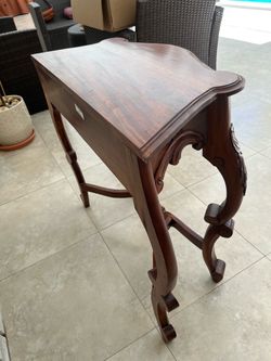 Ornate carve wood console table