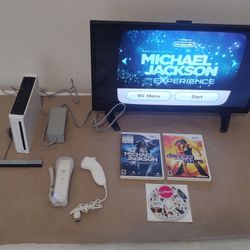 Nintendo Wii Bundle with Remote and Games - READ