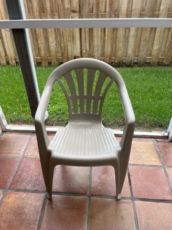 Tan Plastic Outdoor Patio Chair Stackable ($10 each , price firm , 20 available )