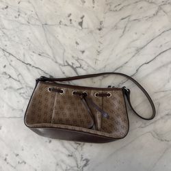 Dooney & Bourke  Tassel top zip