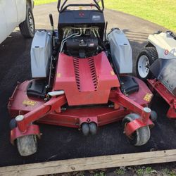 2 STAND UP MOWERS FOR SALE 