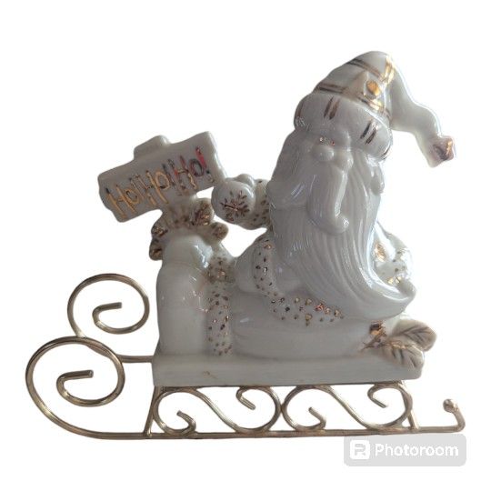 Vintage Porcelain Christmas Ho! Ho! Ho! Santa On Sled Christmas Figurine.
