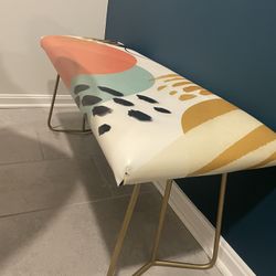 Multicolored bench with gold accents
