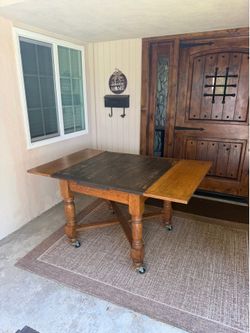 Expandable Wood Drop-Leaf Dining table on Wheels