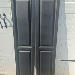 2 Sets New Raised Panel Black Vinyl Shutters 15”x 71”. $20 A Set. No Hardware. Must Pickup
