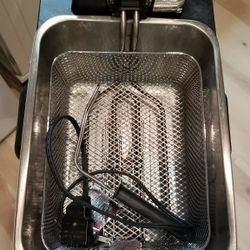 Free: T-Fal 3.5L Stainless Steel Deep Fryer with built-in oil filtration and basket.