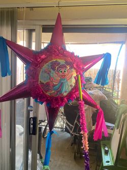 piñata with an Abby Cadabby (Sesame Street) birthday theme.
